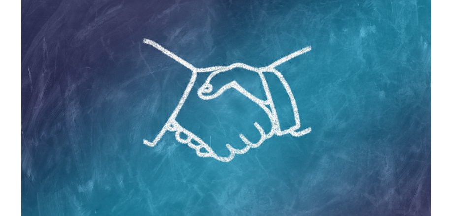 Image of a handshake as a sign of agreement